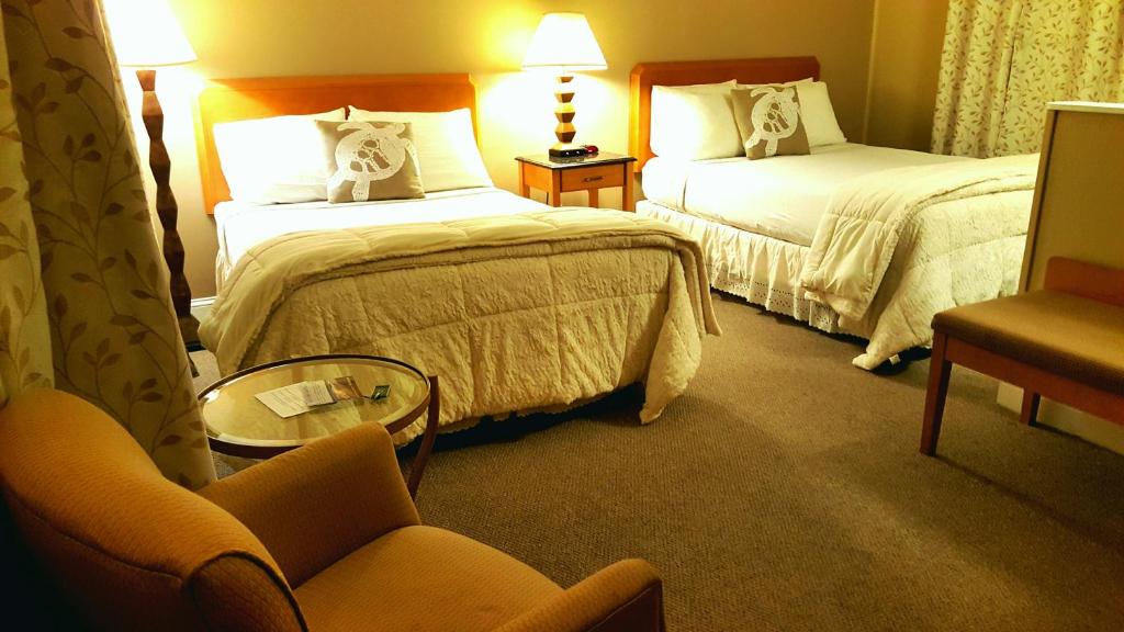 Postel nebo postele na pokoji v ubytování Starlight Lodge Cape Cod