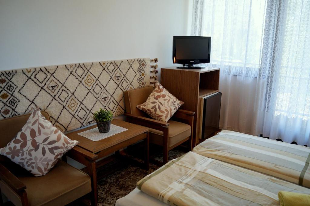 Łóżko lub łóżka w pokoju w obiekcie Sophie's Guesthouse