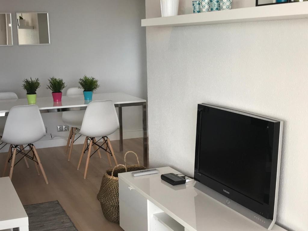 TV a/nebo společenská místnost v ubytování Apartments Campello