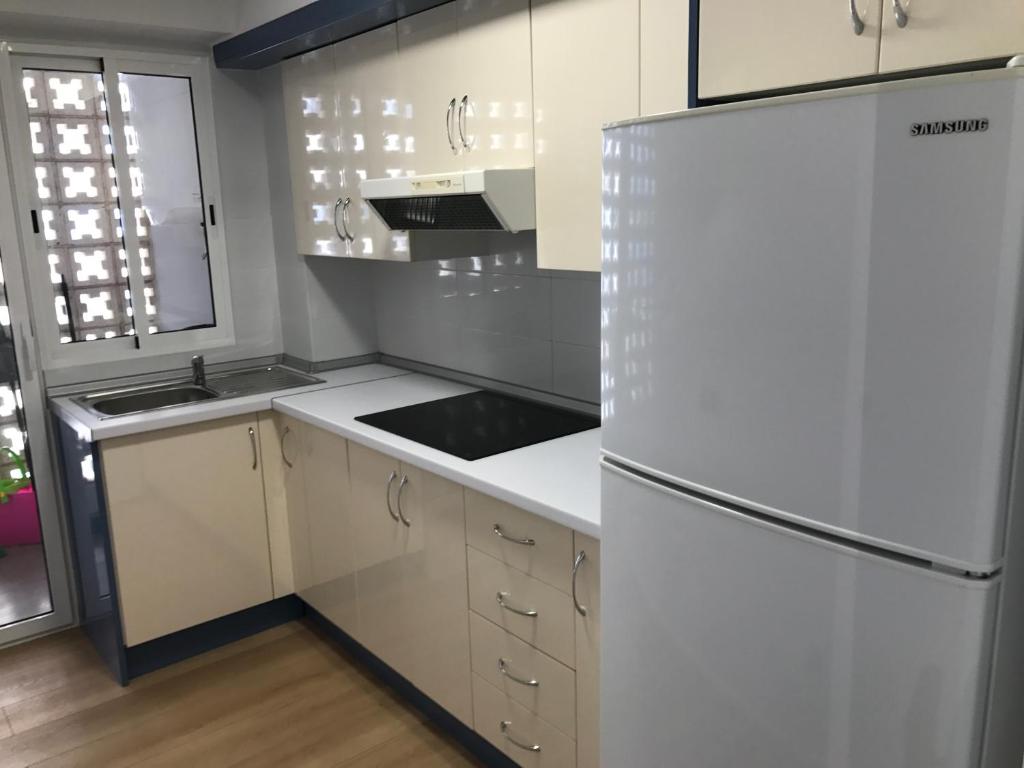 Kuchyň nebo kuchyňský kout v ubytování Apartments Campello