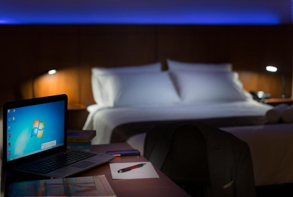 TV a/nebo společenská místnost v ubytování Hotel La Ría Durán