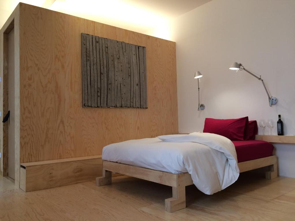 Postel nebo postele na pokoji v ubytování winebnb