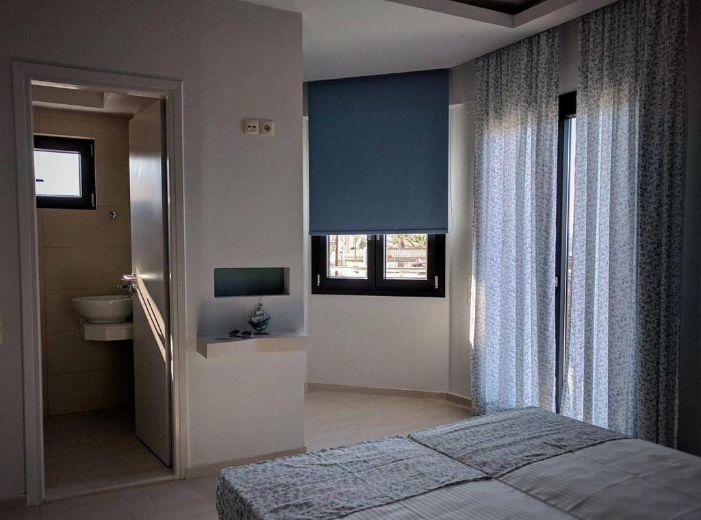 Postel nebo postele na pokoji v ubytování Levante Sea View Studios