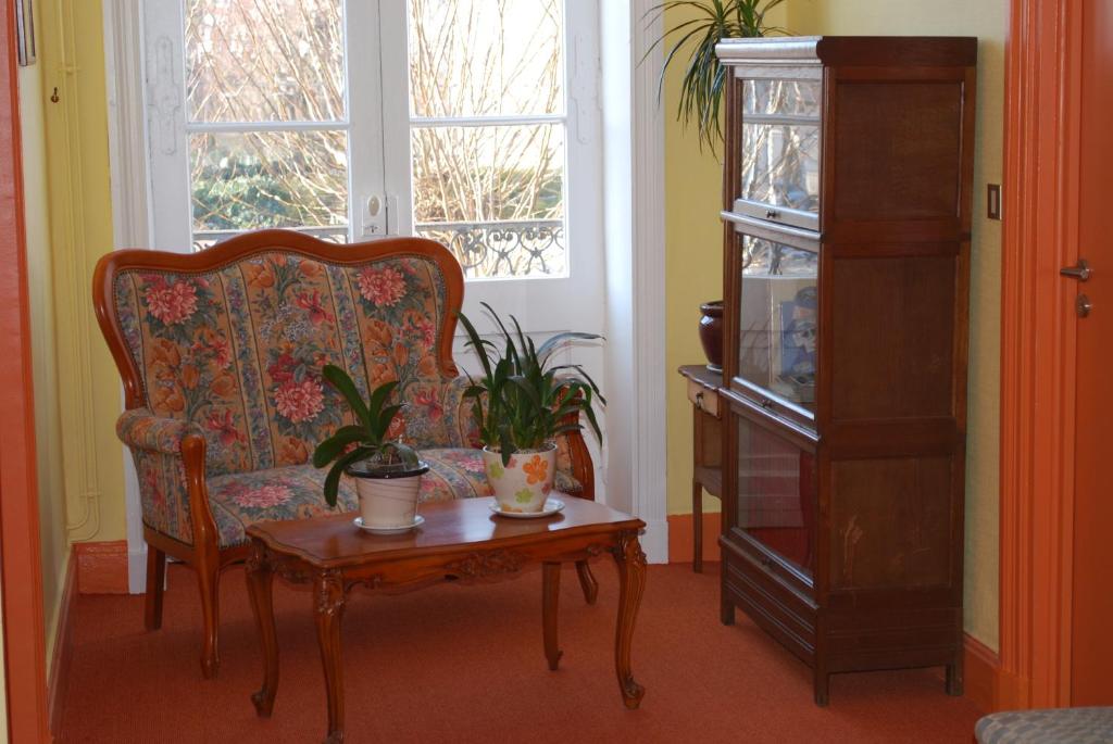 Posezení v ubytování L'Hôtel L'Astrée