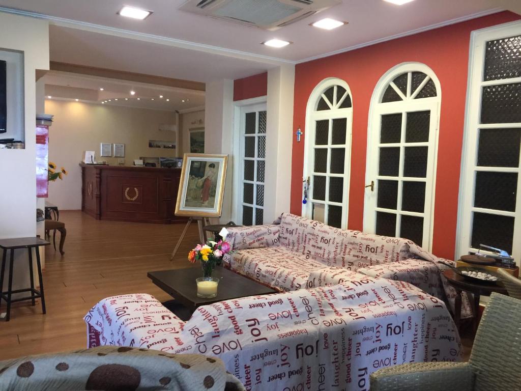Postel nebo postele na pokoji v ubytování Hotel Methanion