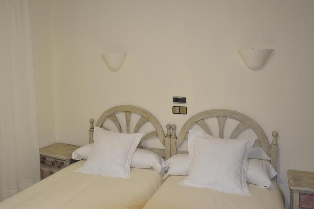 Postel nebo postele na pokoji v ubytování Hotel Balcón de Cazorla