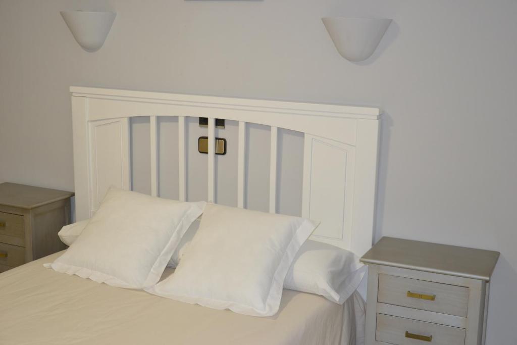 Postel nebo postele na pokoji v ubytování Hotel Balcón de Cazorla