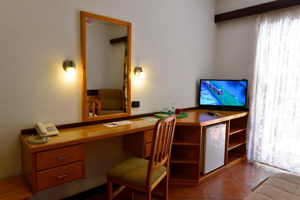TV o dispositivi per l'intrattenimento presso Hotel Restaurant Papillon