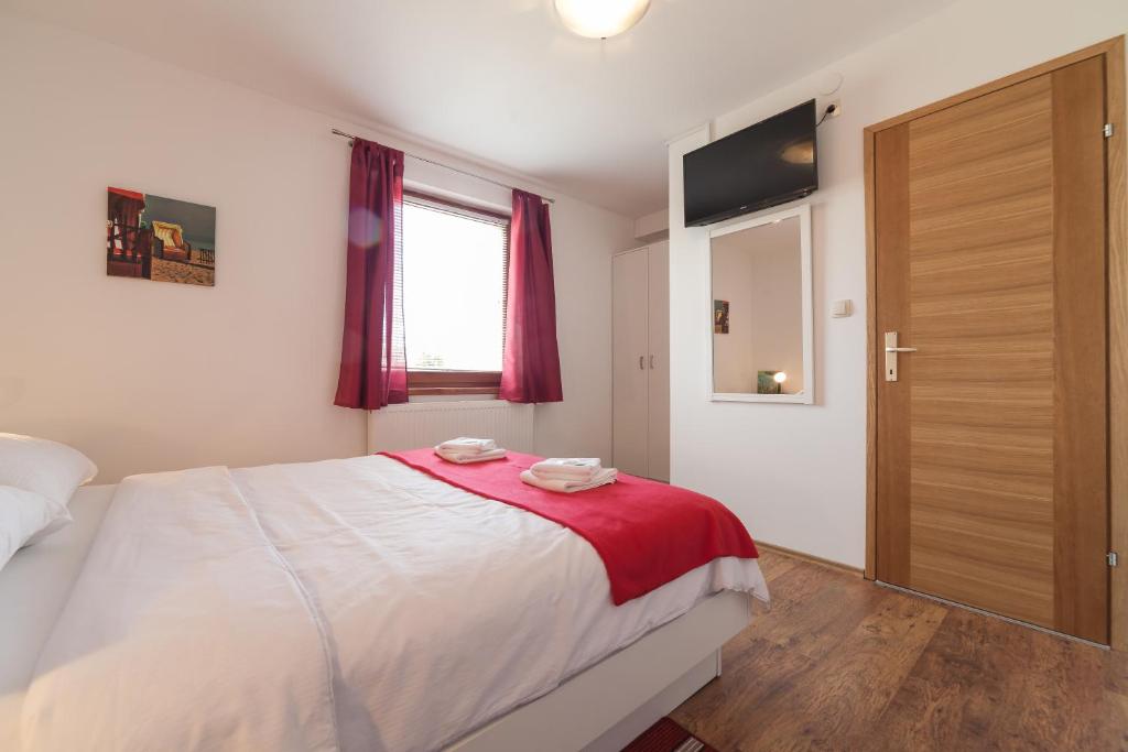 Postel nebo postele na pokoji v ubytování Breza Guesthouse