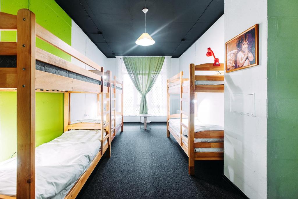 Postel nebo postele na pokoji v ubytování Happy Hostel Kiev