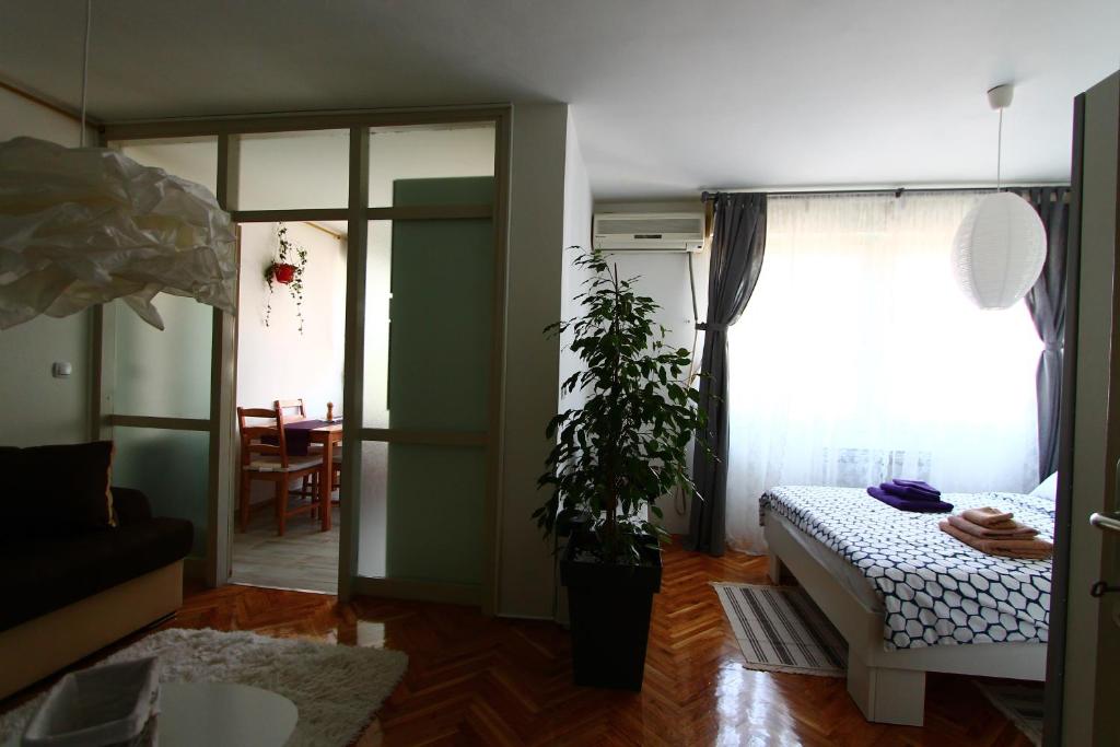 Posteľ alebo postele v izbe v ubytovaní Apartment Melon
