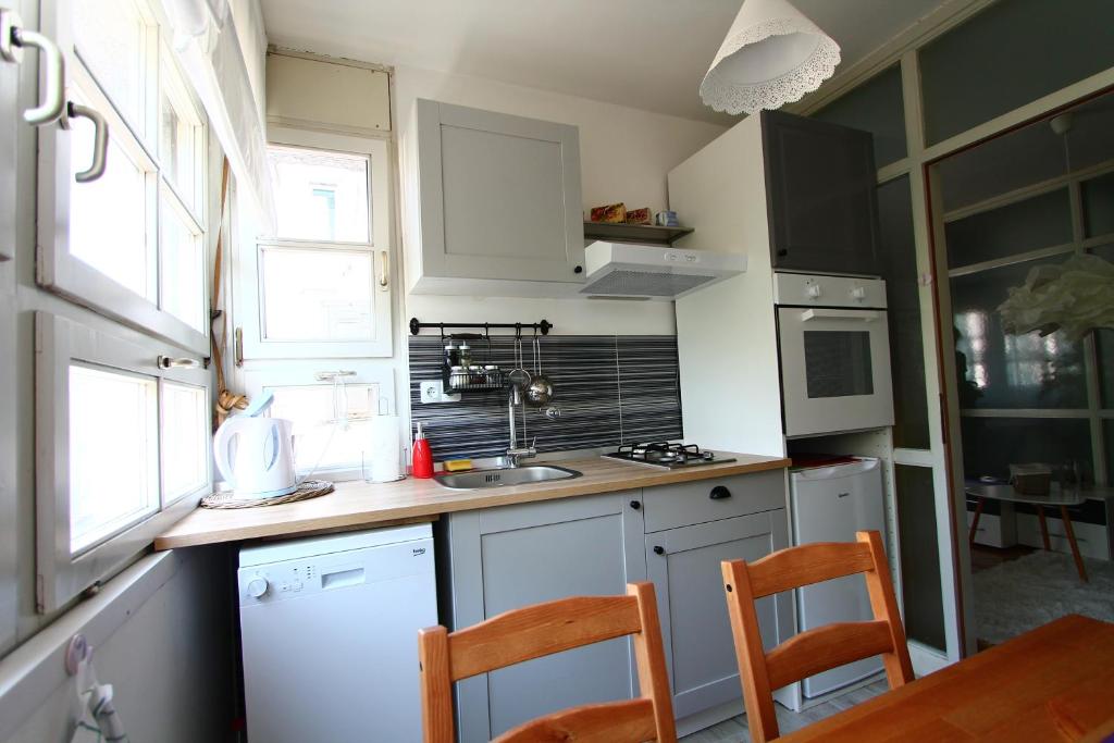 Kuchyňa alebo kuchynka v ubytovaní Apartment Melon