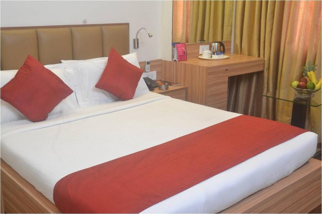 Postel nebo postele na pokoji v ubytování Hotel Plaza