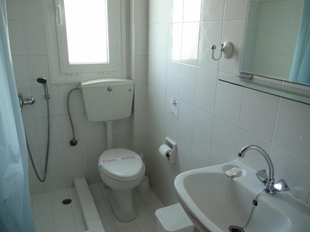 A bathroom at Filoxenia Hotel & Apartments