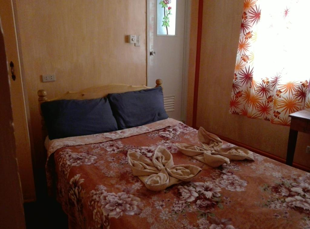 Postel nebo postele na pokoji v ubytování Koreen Guest House