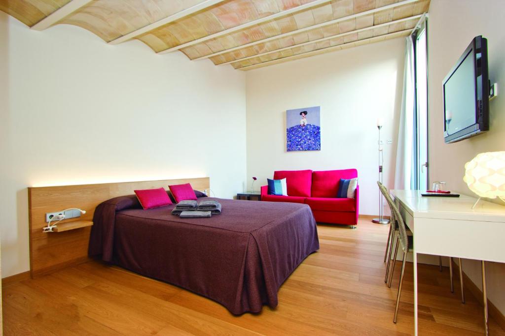 Ένα ή περισσότερα κρεβάτια σε δωμάτιο στο Hotel Can Bo De Pau