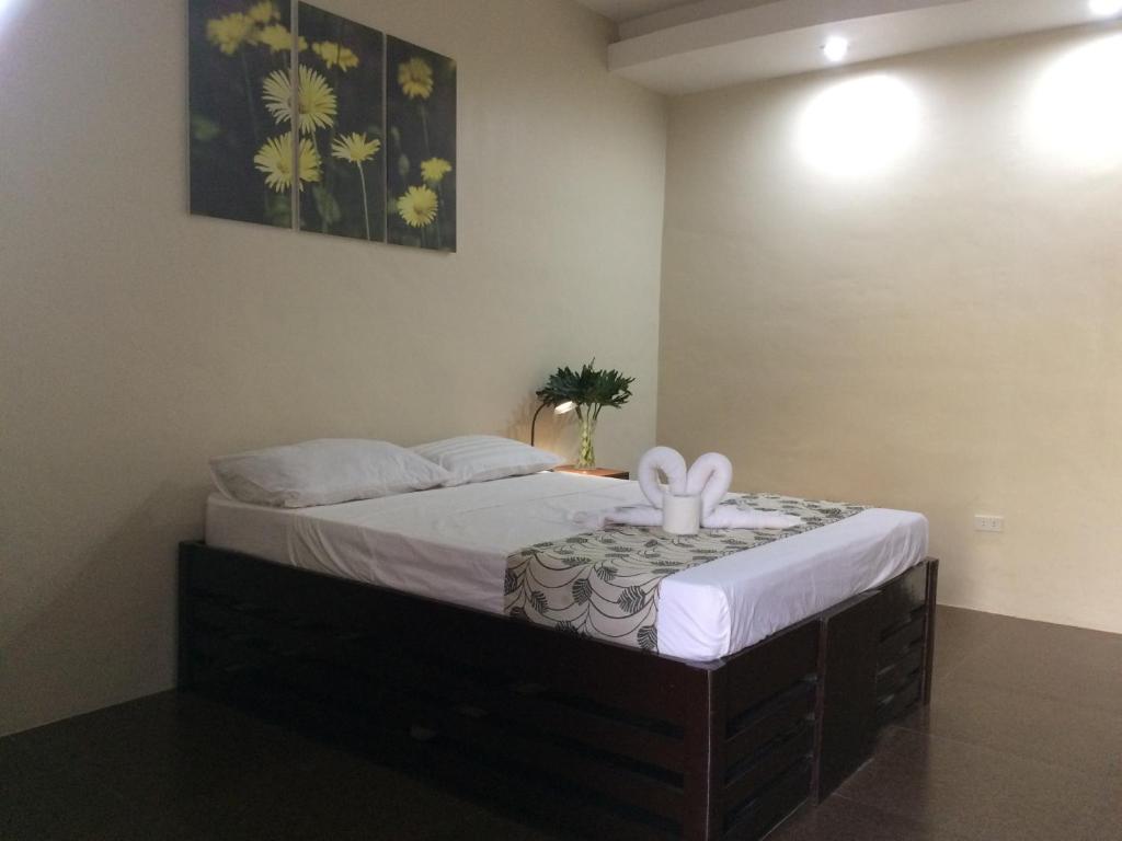 Postel nebo postele na pokoji v ubytování Mañana Hotel