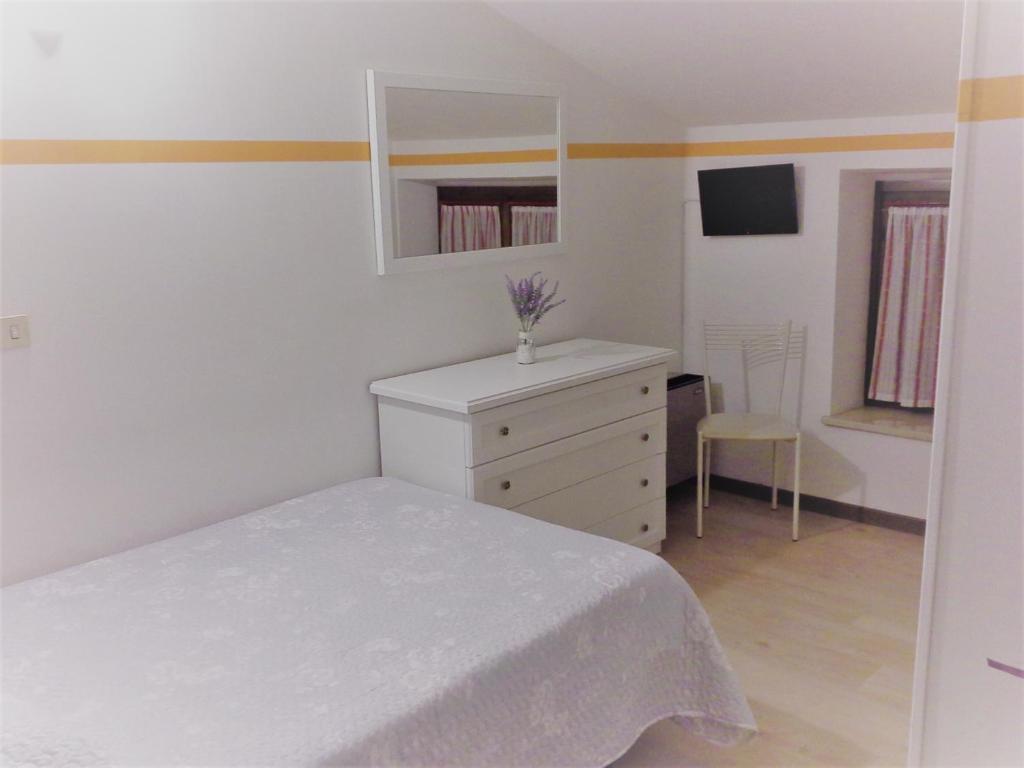 Postel nebo postele na pokoji v ubytování Hotel La Rama