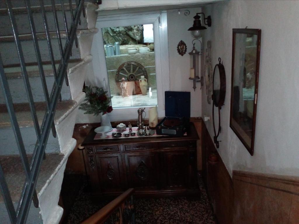 TV a/nebo společenská místnost v ubytování Albergo Milano 1920