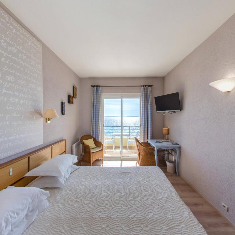 Postel nebo postele na pokoji v ubytování Grand Hotel Moriaz