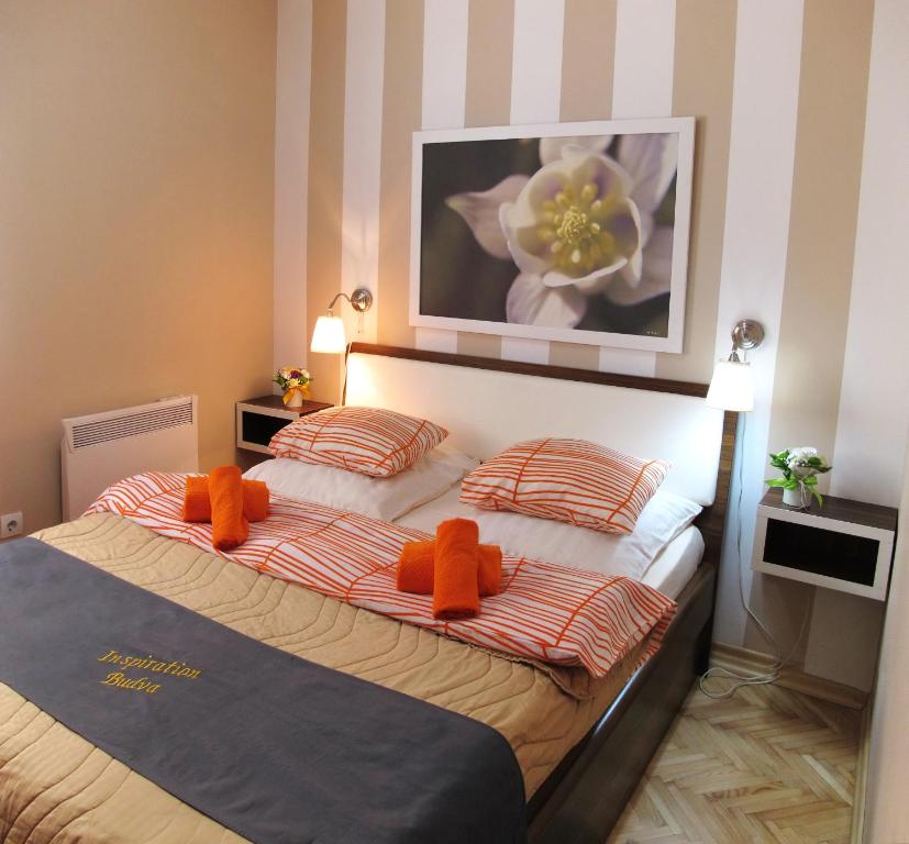 Postel nebo postele na pokoji v ubytování Apartments Inspiration