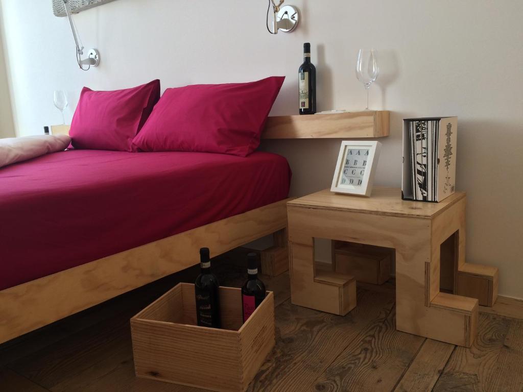 Postel nebo postele na pokoji v ubytování winebnb