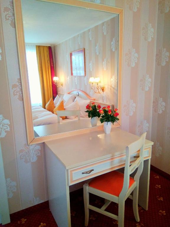 Postel nebo postele na pokoji v ubytování Alexa Hotel