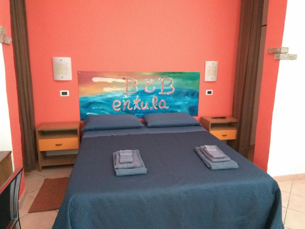 Postel nebo postele na pokoji v ubytování Entula