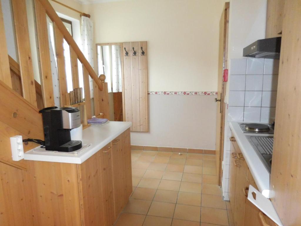 Kuchyň nebo kuchyňský kout v ubytování Haus am See