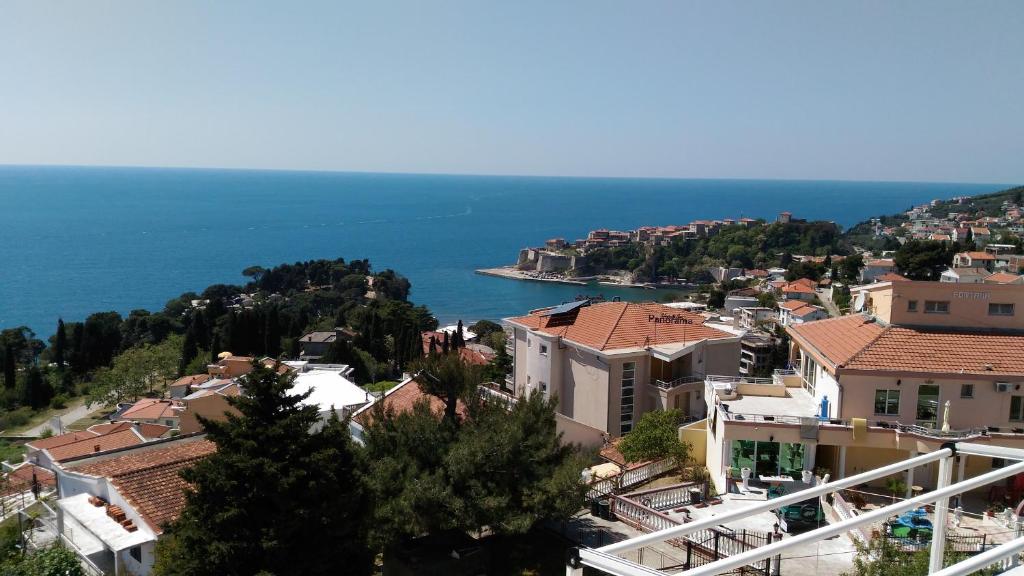 a view of a town and the ocean at Apartment Boksi in Ulcinj