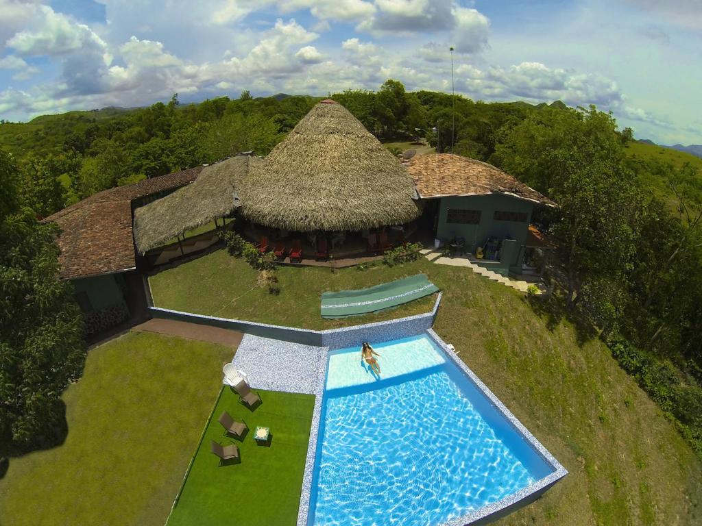 an overhead view of a house with a swimming pool at La Pintada Inn in La Pintada