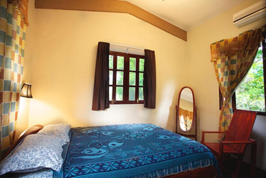 Postel nebo postele na pokoji v ubytování La Pintada Inn
