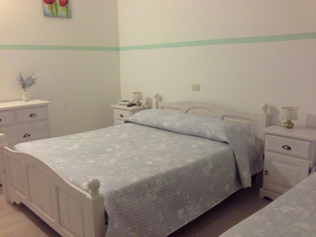 Postel nebo postele na pokoji v ubytování Hotel La Rama