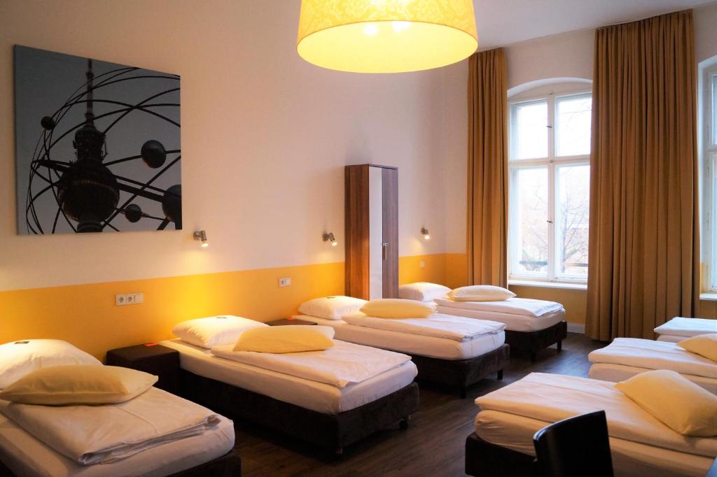 Postel nebo postele na pokoji v ubytování Grand Hostel Berlin Classic