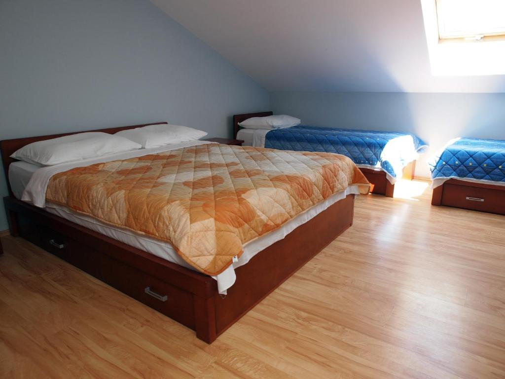 Postel nebo postele na pokoji v ubytování Hotel R