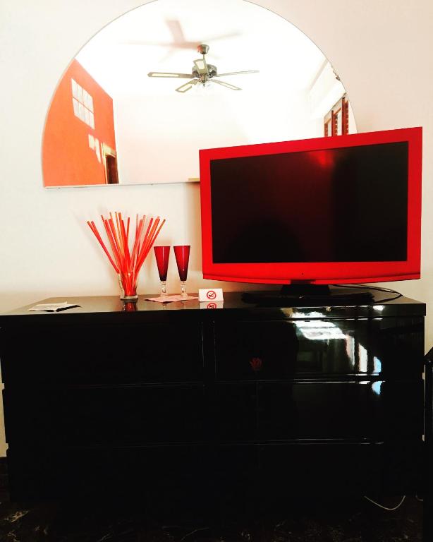 TV a/nebo společenská místnost v ubytování B&B Lo Scrigno