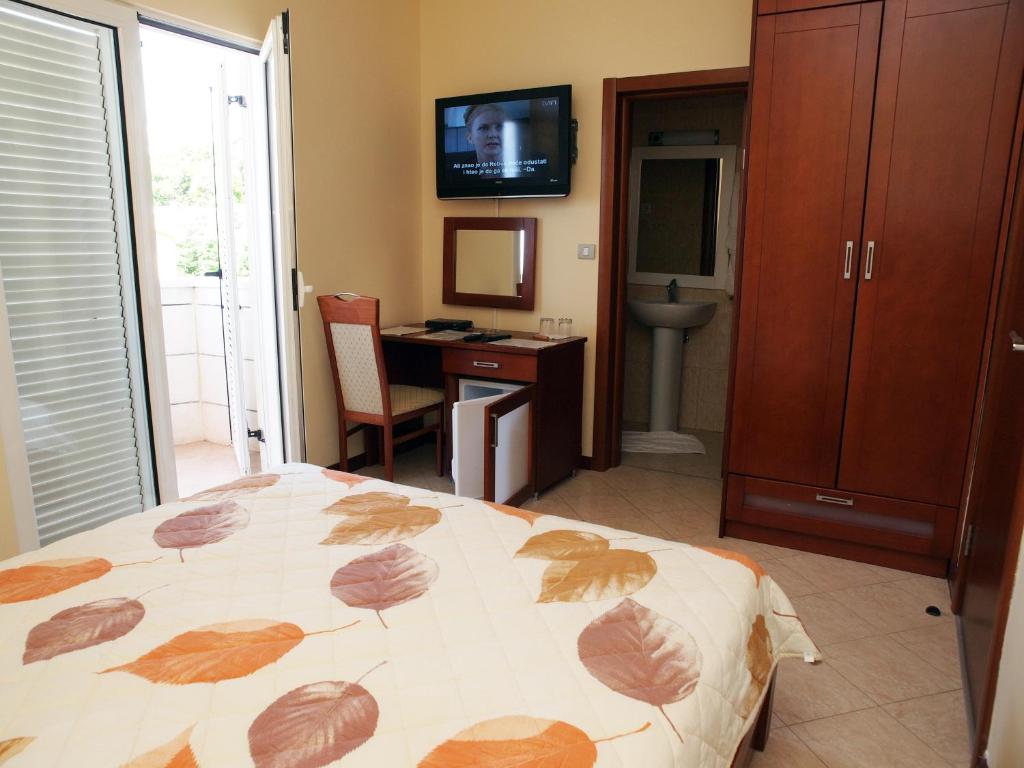 Postel nebo postele na pokoji v ubytování Hotel R