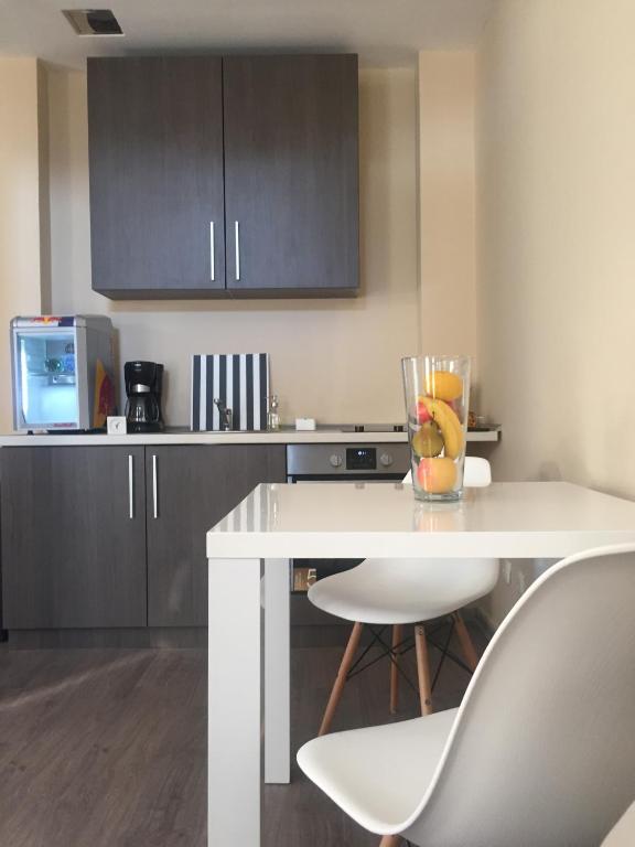 Kuchyň nebo kuchyňský kout v ubytování Top Apartment