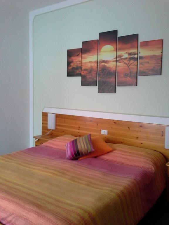 Postel nebo postele na pokoji v ubytování Albergo Krissin