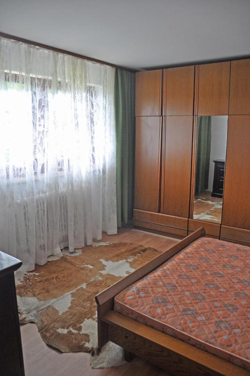 Postel nebo postele na pokoji v ubytování Apartments MM