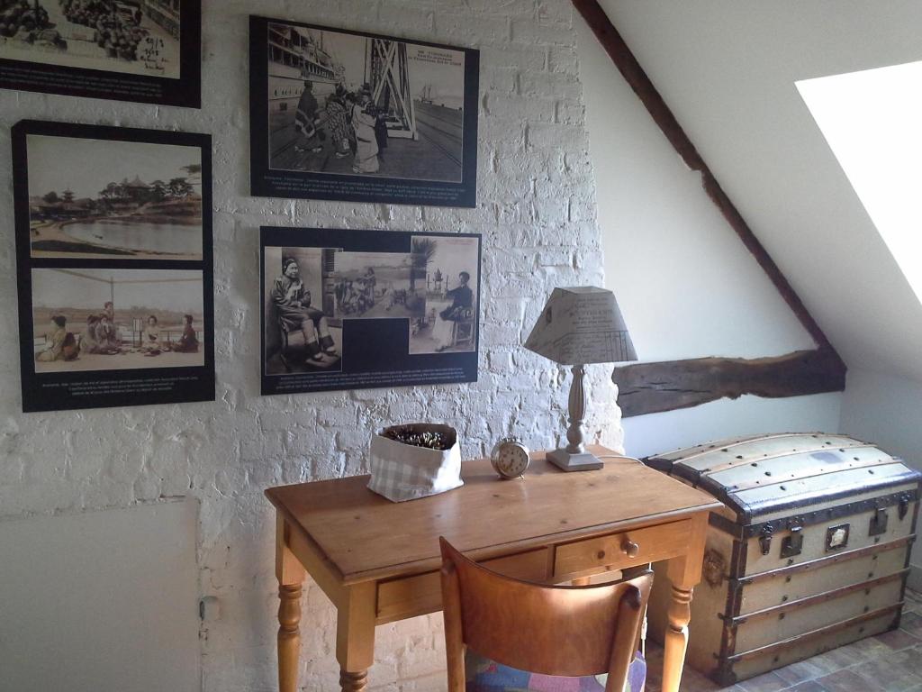Postel nebo postele na pokoji v ubytování Mansion Victorine