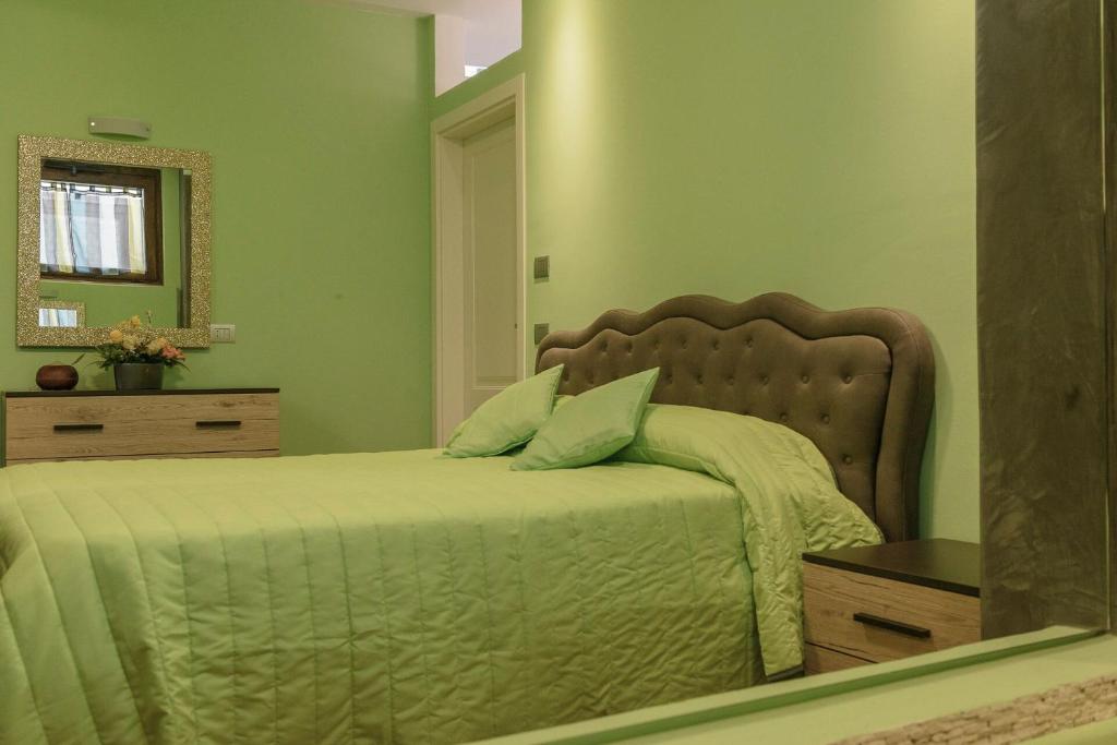 Łóżko lub łóżka w pokoju w obiekcie Appartamenti Luxury Arco