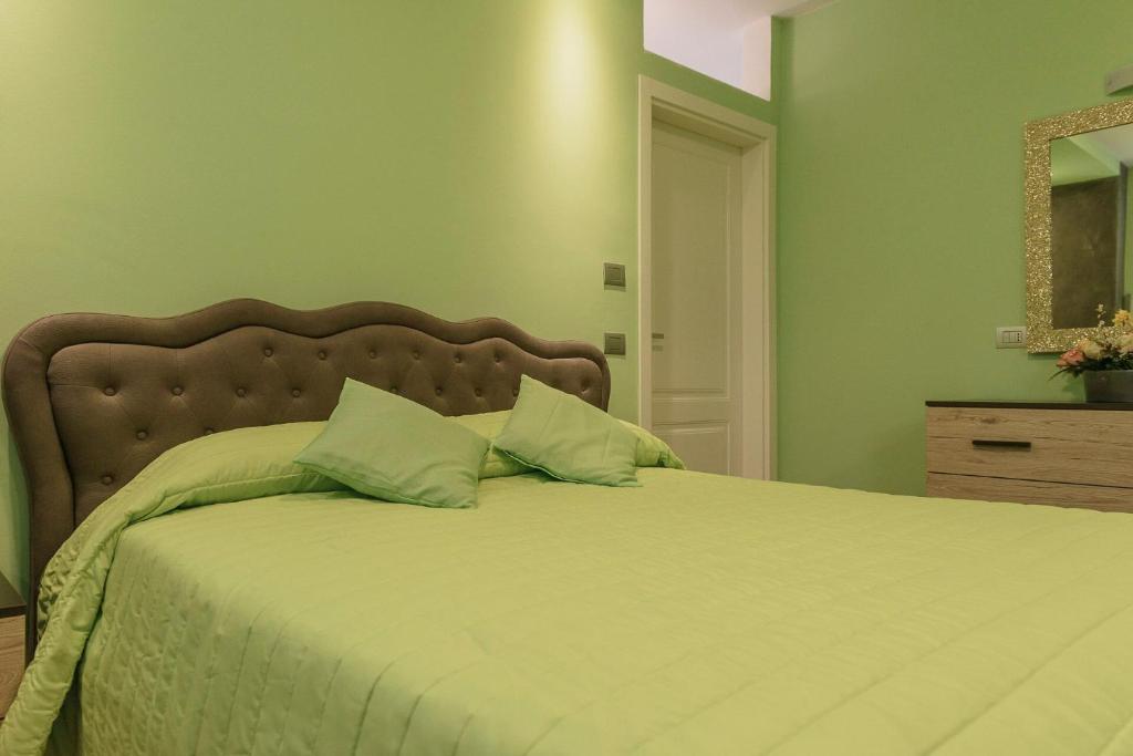 Łóżko lub łóżka w pokoju w obiekcie Appartamenti Luxury Arco