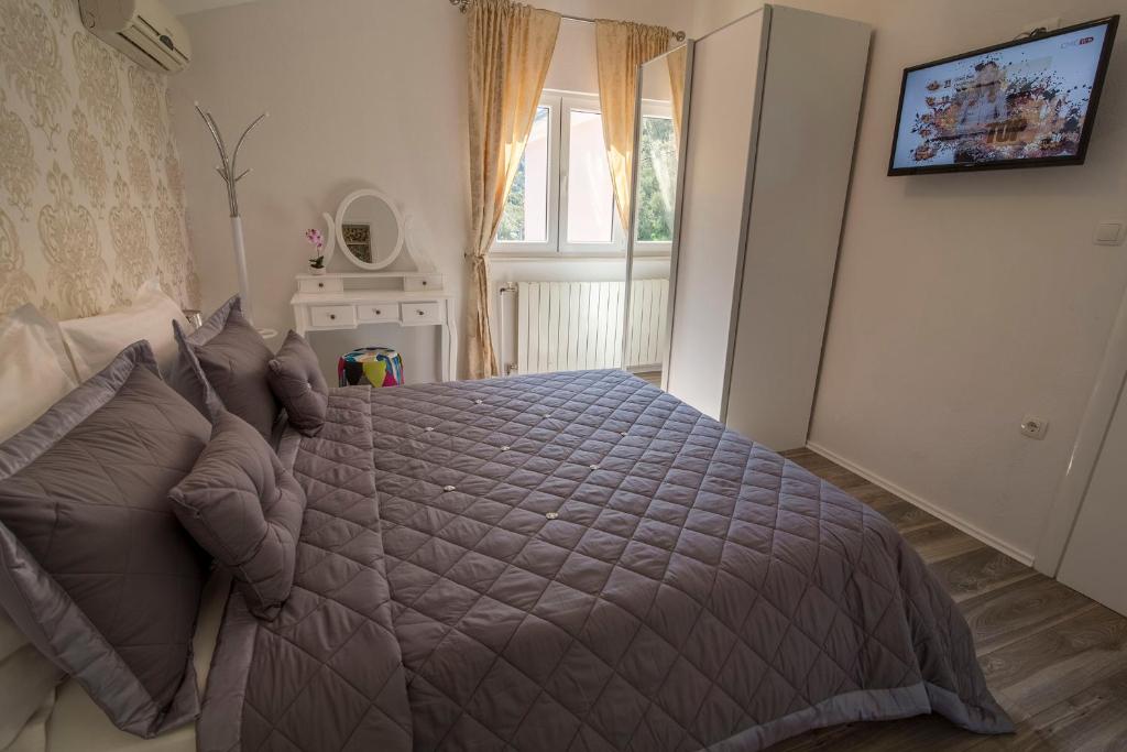 Postel nebo postele na pokoji v ubytování Villa Petra Apartment with private pool