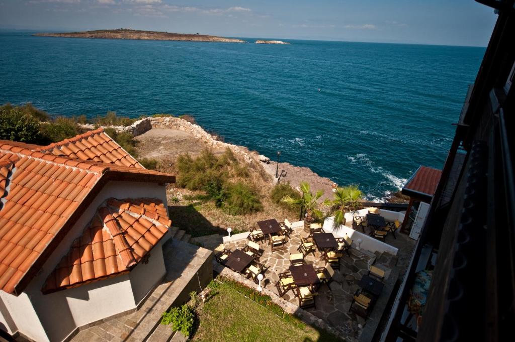 an aerial view of a house and the ocean at Guest House Doctor's House in Sozopol