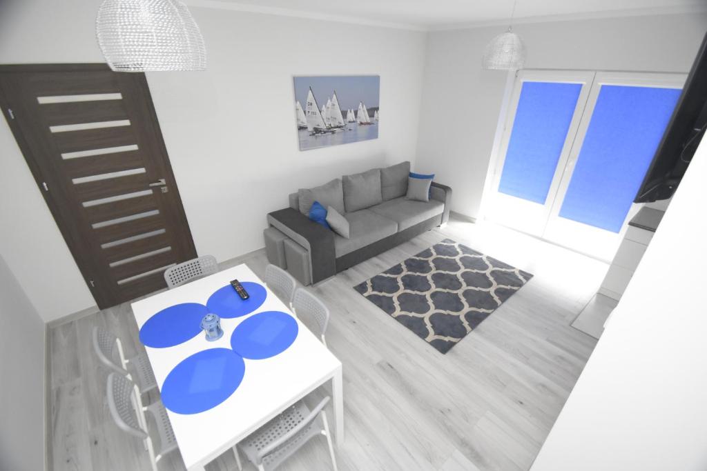 Posedenie v ubytovaní Mazuria Apartamenty