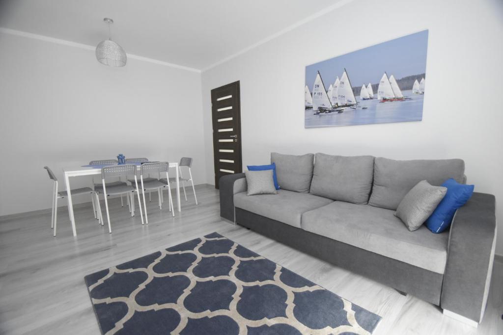 Posedenie v ubytovaní Mazuria Apartamenty