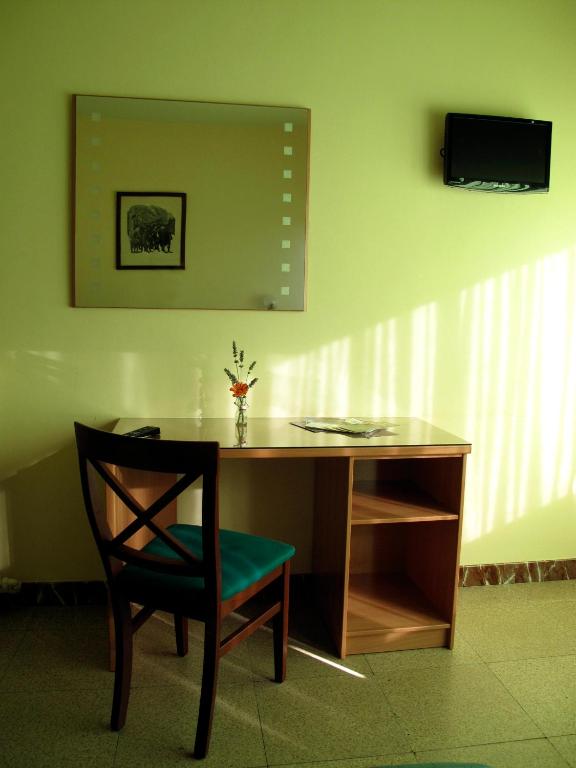 TV a/nebo společenská místnost v ubytování Hotel Martinez