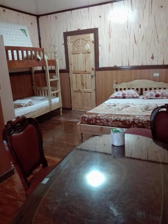 Postel nebo postele na pokoji v ubytování Koreen Guest House