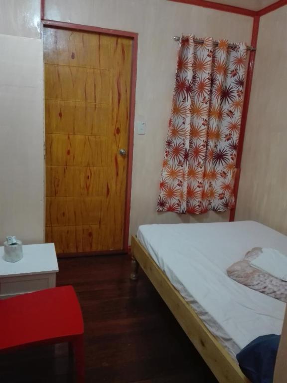 Postel nebo postele na pokoji v ubytování Koreen Guest House